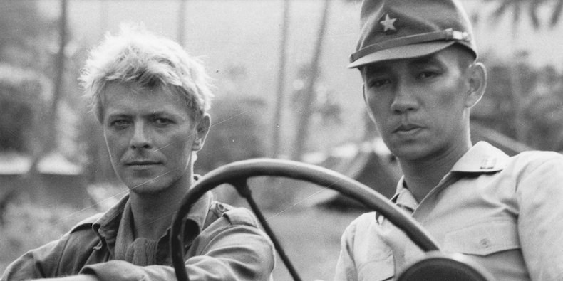 David Bowie and Ryūichi Sakamoto on the set of Merry Christmas, Mr. Lawrence